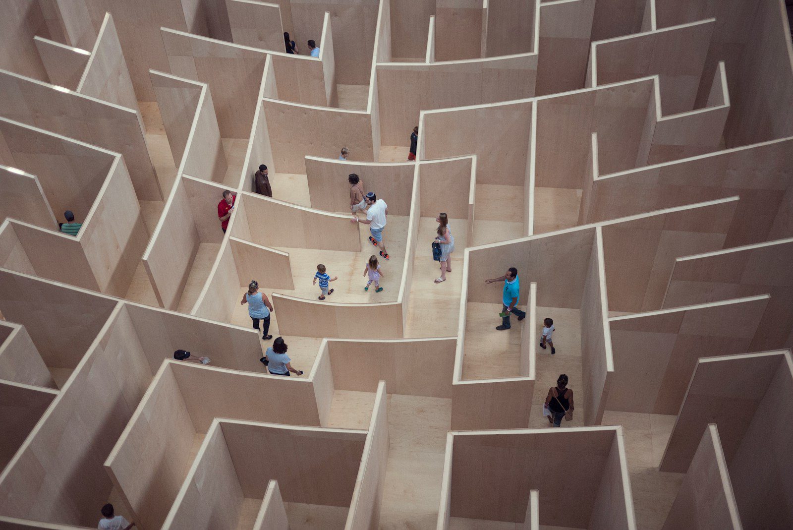 people sitting on white concrete stairs