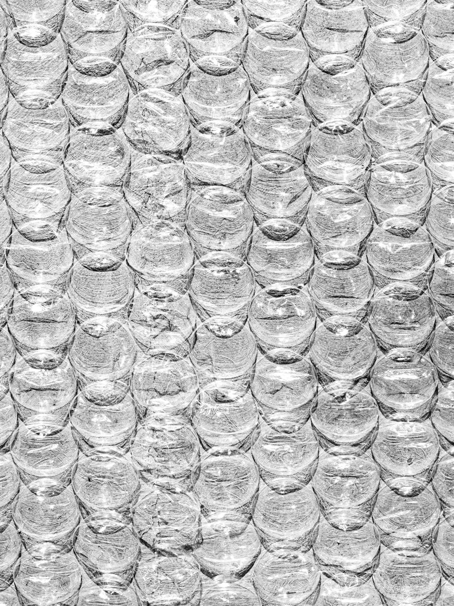 grayscale photo of water droplets on glass