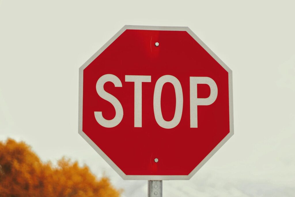 selective-photography of stop signage